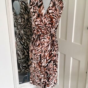 Jones & Co.Mobwifeleopard print  faux wrap dress with front tie. size small. EUC